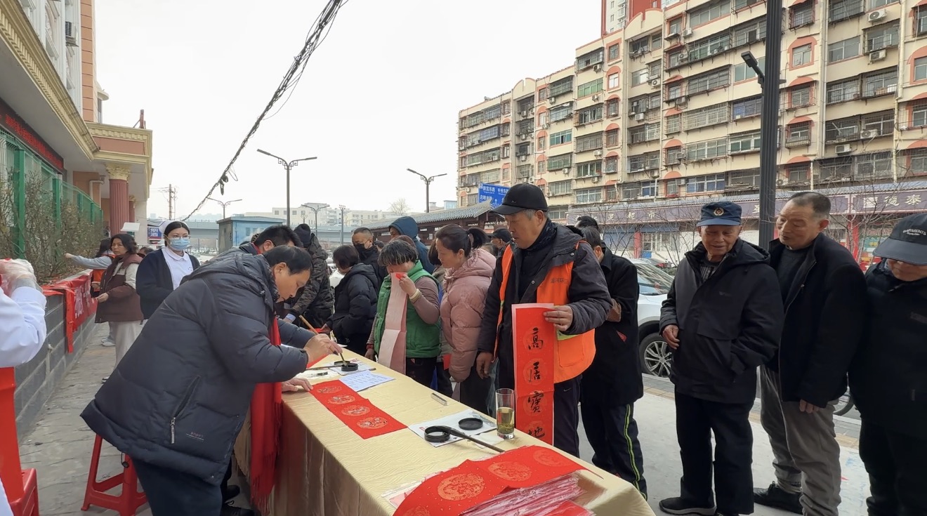 墨香传暖意，春联送福来——我院举办“迎新春，送春联”活动